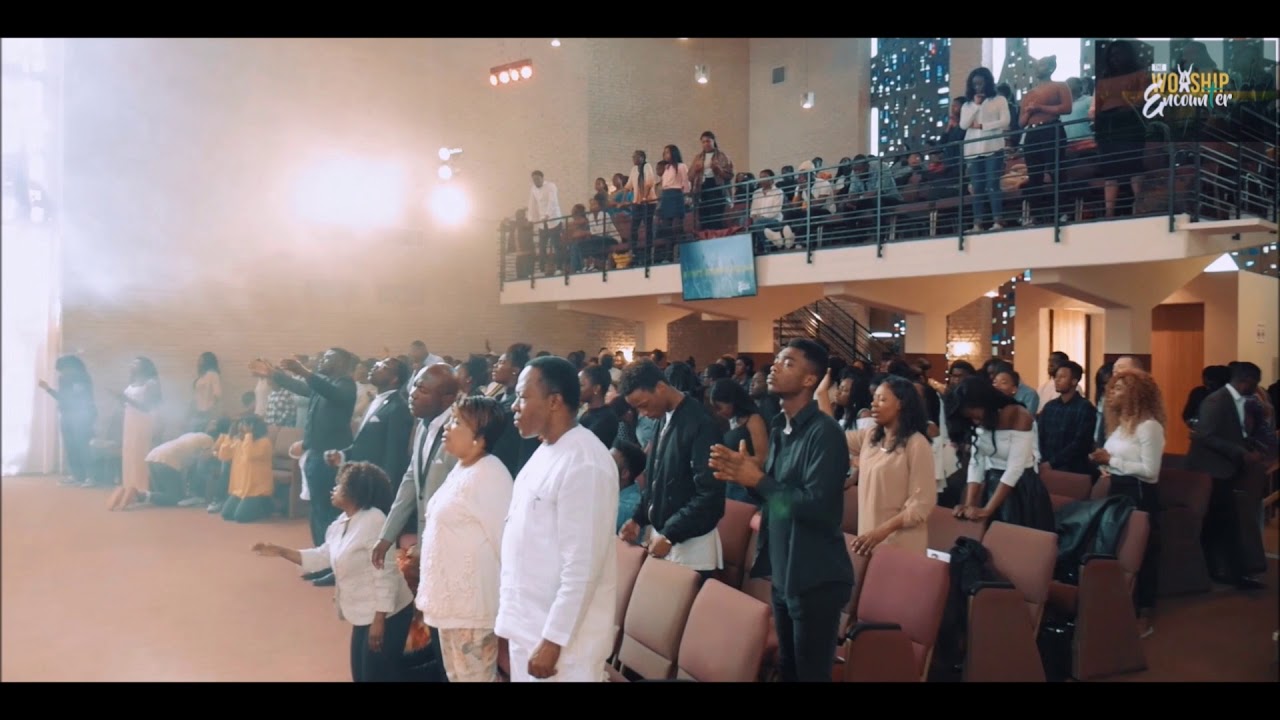 Minister Samuel Osei​ leading worship at The Worship Encounter 2