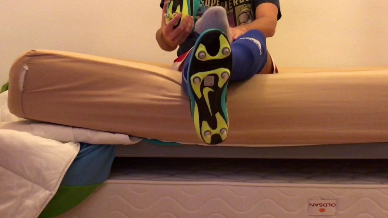 Playing in bed with 2 pairs of soccer socks