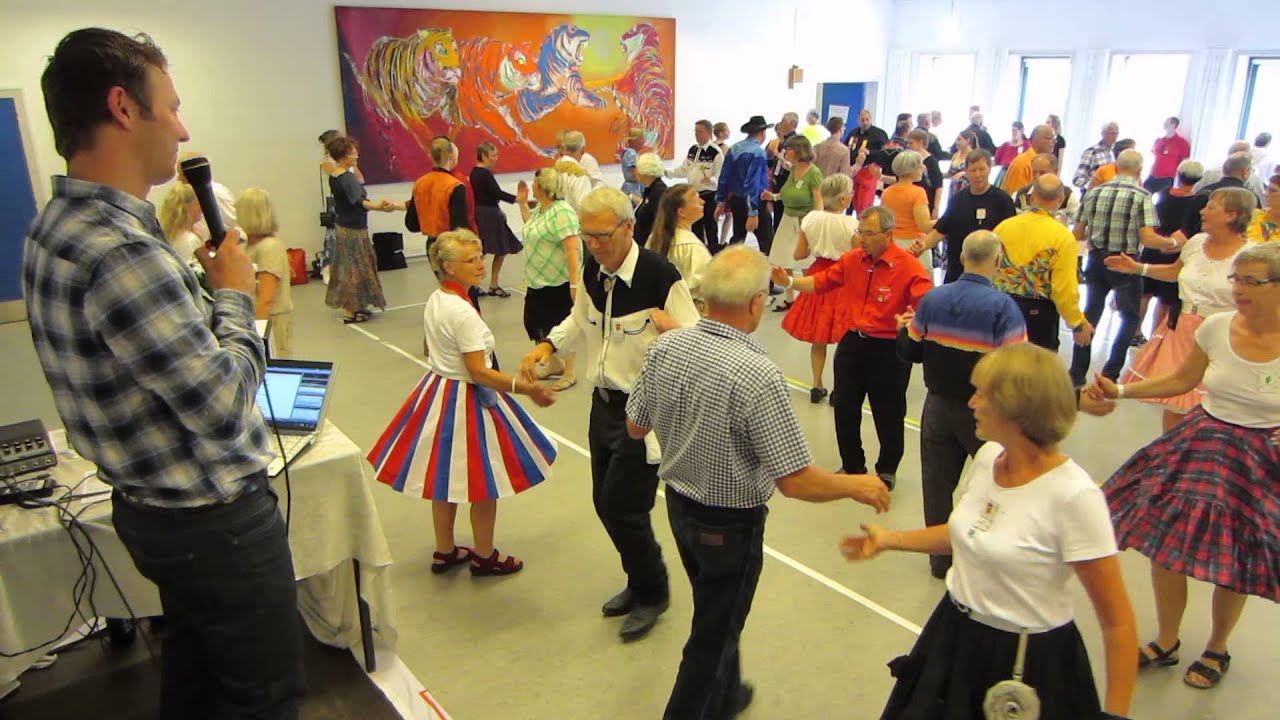 NilsTrottmann doing a singing call at Danish Square Dance Convention 2015