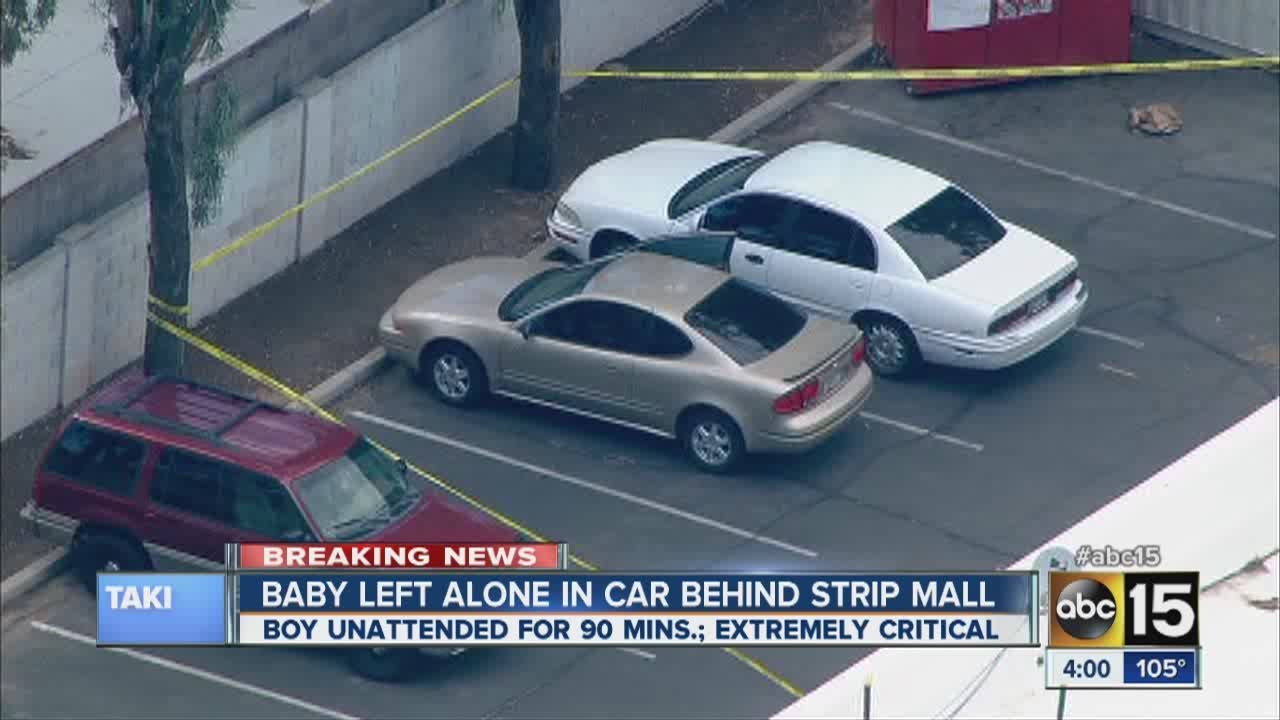 Baby left alone in car behind strip mall