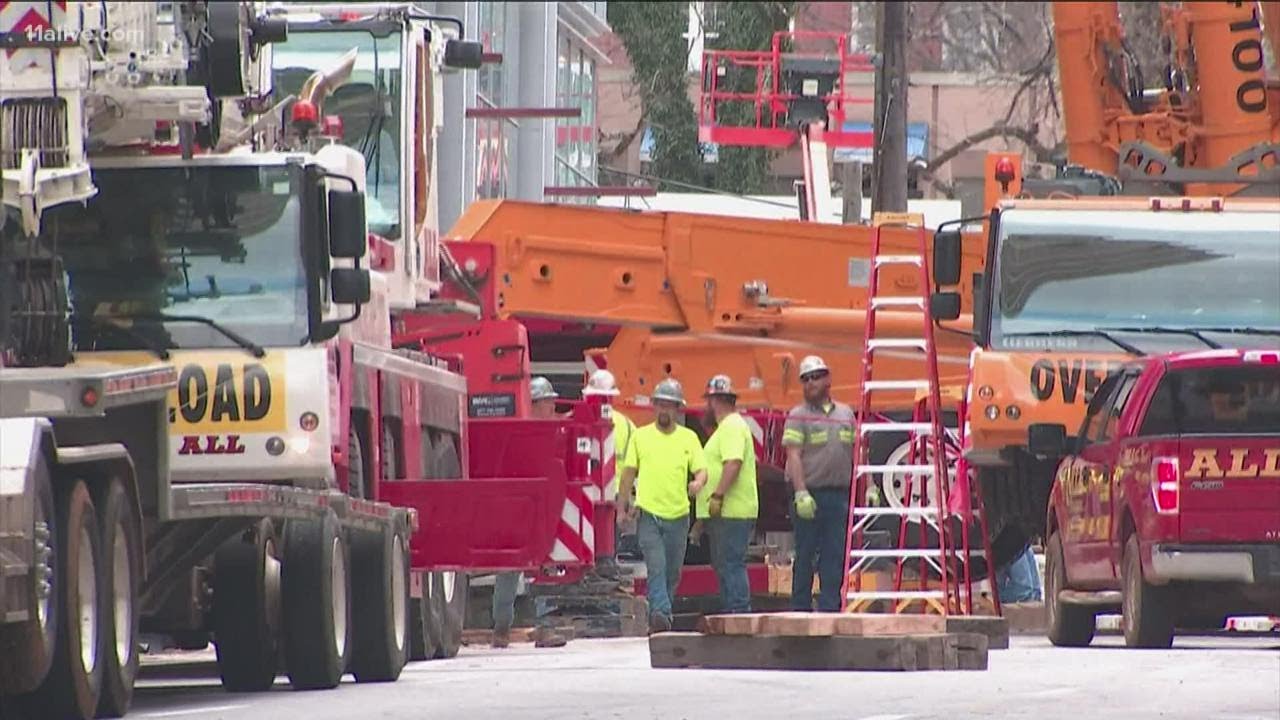 Leaning crane at Midtown Atlanta construction site nearly removed