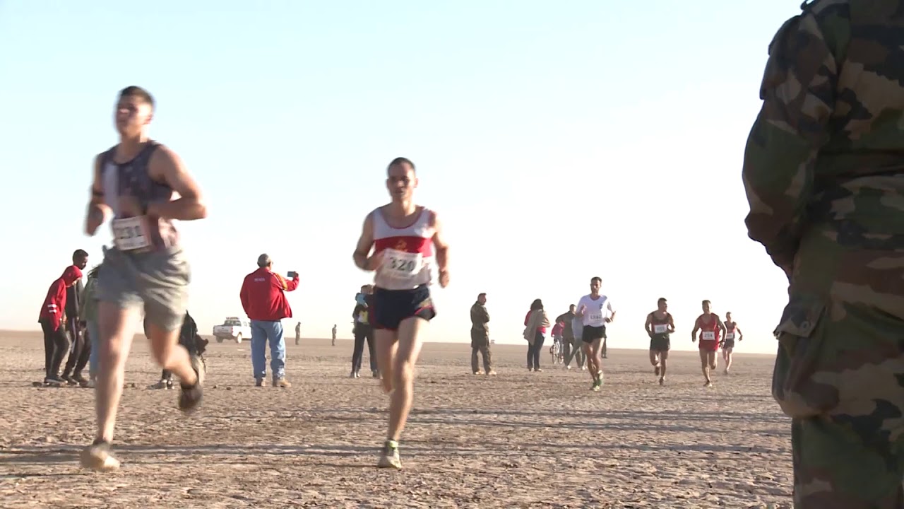 Service members participate in the 35th Annual Grand Bara Race