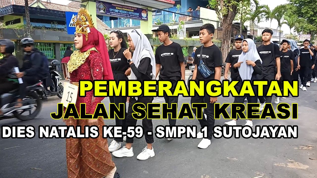 Pemberangkatan Jalan Sehat Kreasi Dies Natalis Ke-59 UPT SMP Negeri 1 Sutojayan