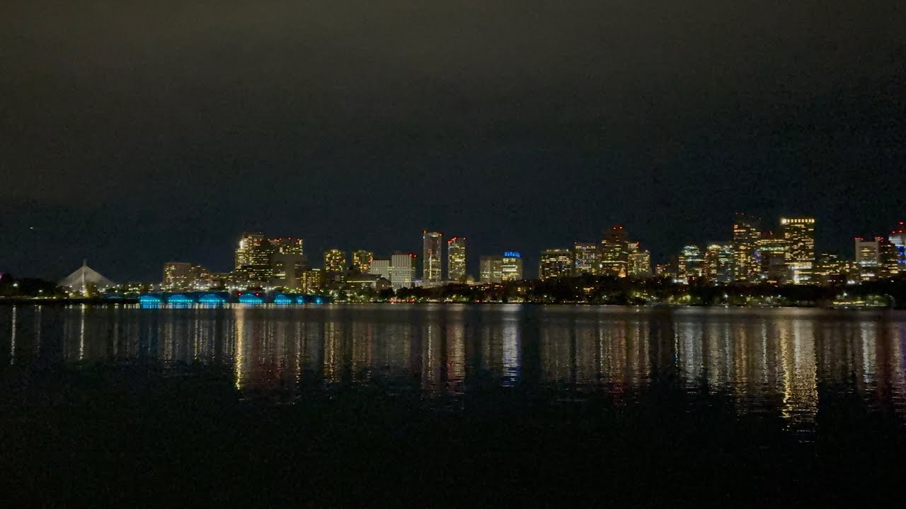 A Nighttime Cruise ride on the Charles River in Boston at night 