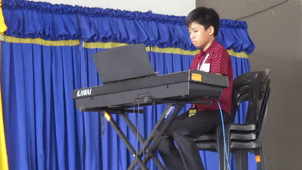 Ennio Playing Piano