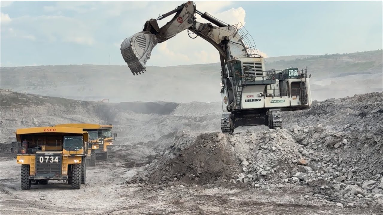 Big monster Liebherr R 9350 Excavator in action || Loading Overburden on Komatsu Dumper 