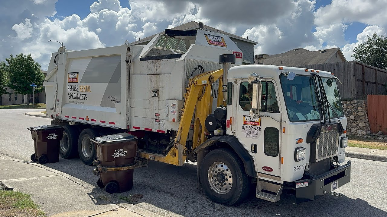 Tiger Sanitation: Rental Peterbilt 520 Heil Python Garbage Truck