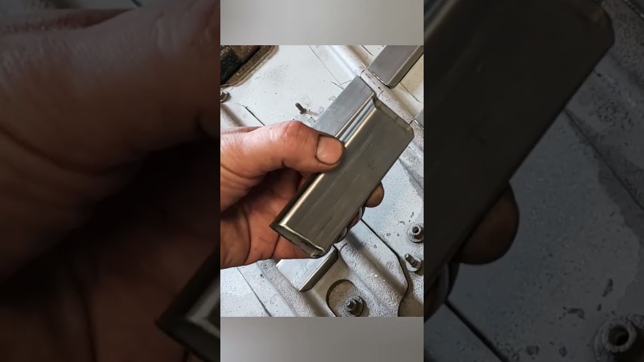 Battery tray sandblasted and reinforcements fabricated 