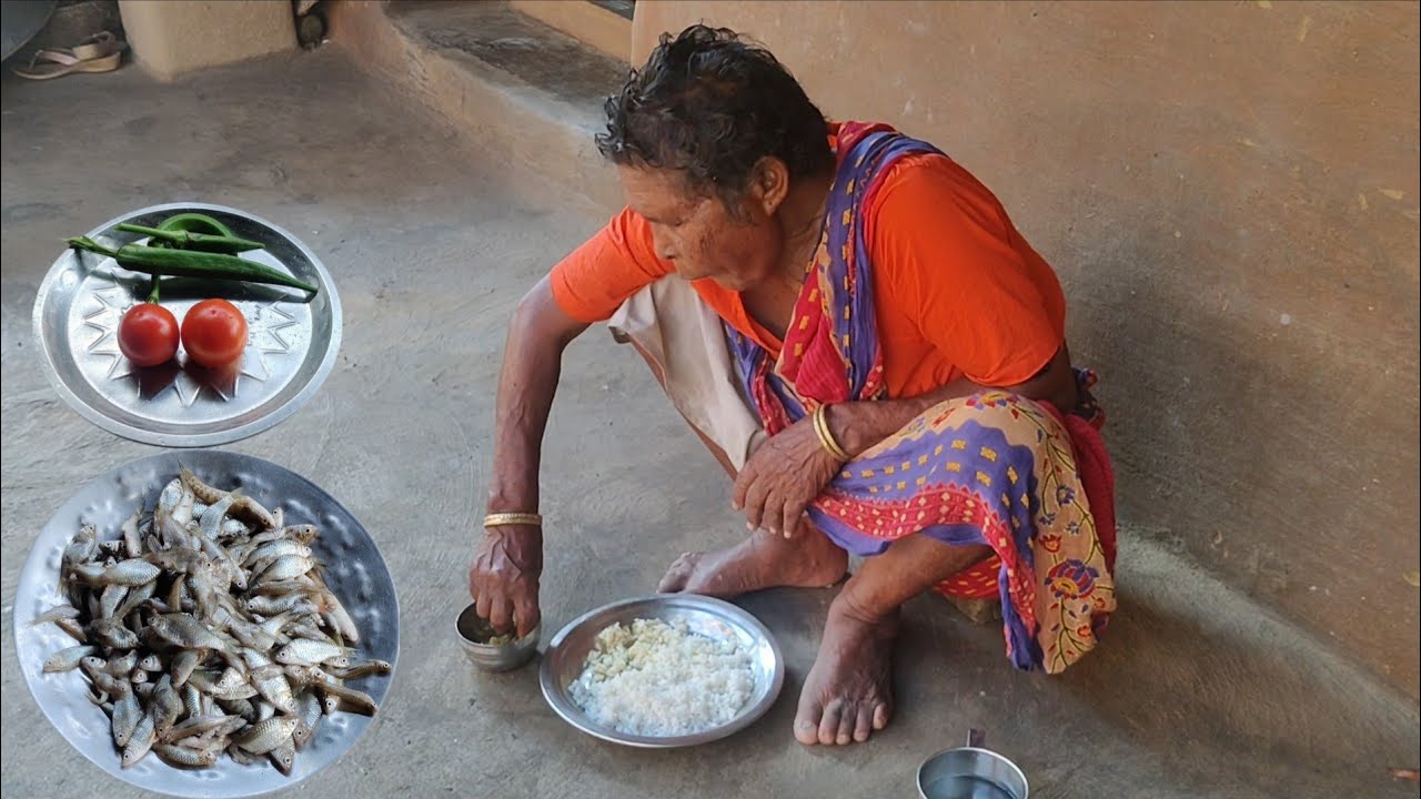 puti macher jhal.puti mach tomato vendi recipe . small fish recipe bengali style .