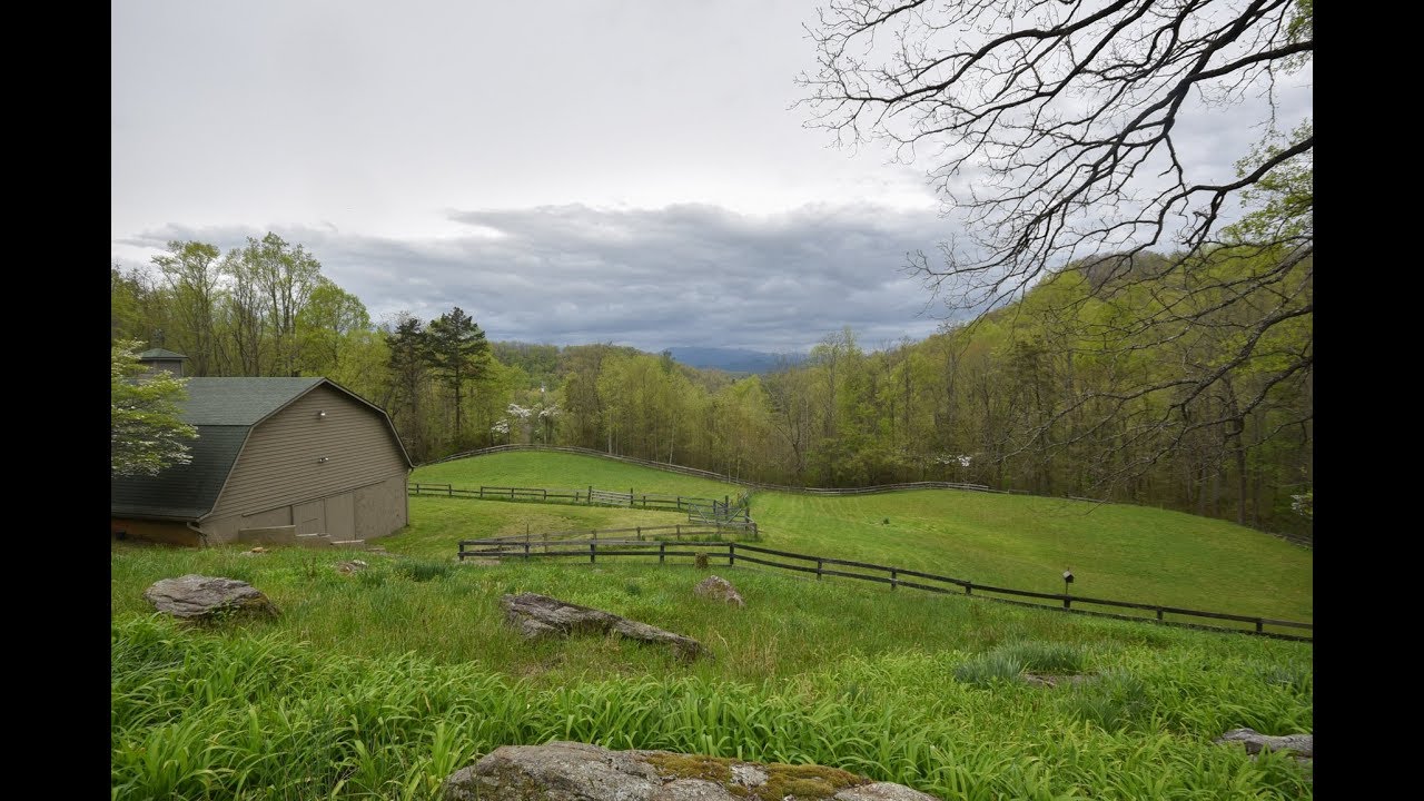 25+ Acres, USFS Border, Barn, Creek, Waterfall, Pond, 2 Homes! For sale in Franklin NC