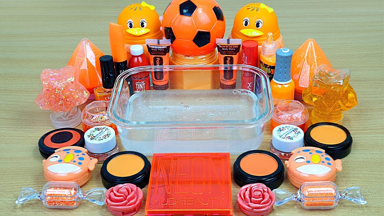 NEON ORANGE SLIME Mixing makeup and glitter into Clear Slime Satisfying Slime Videos