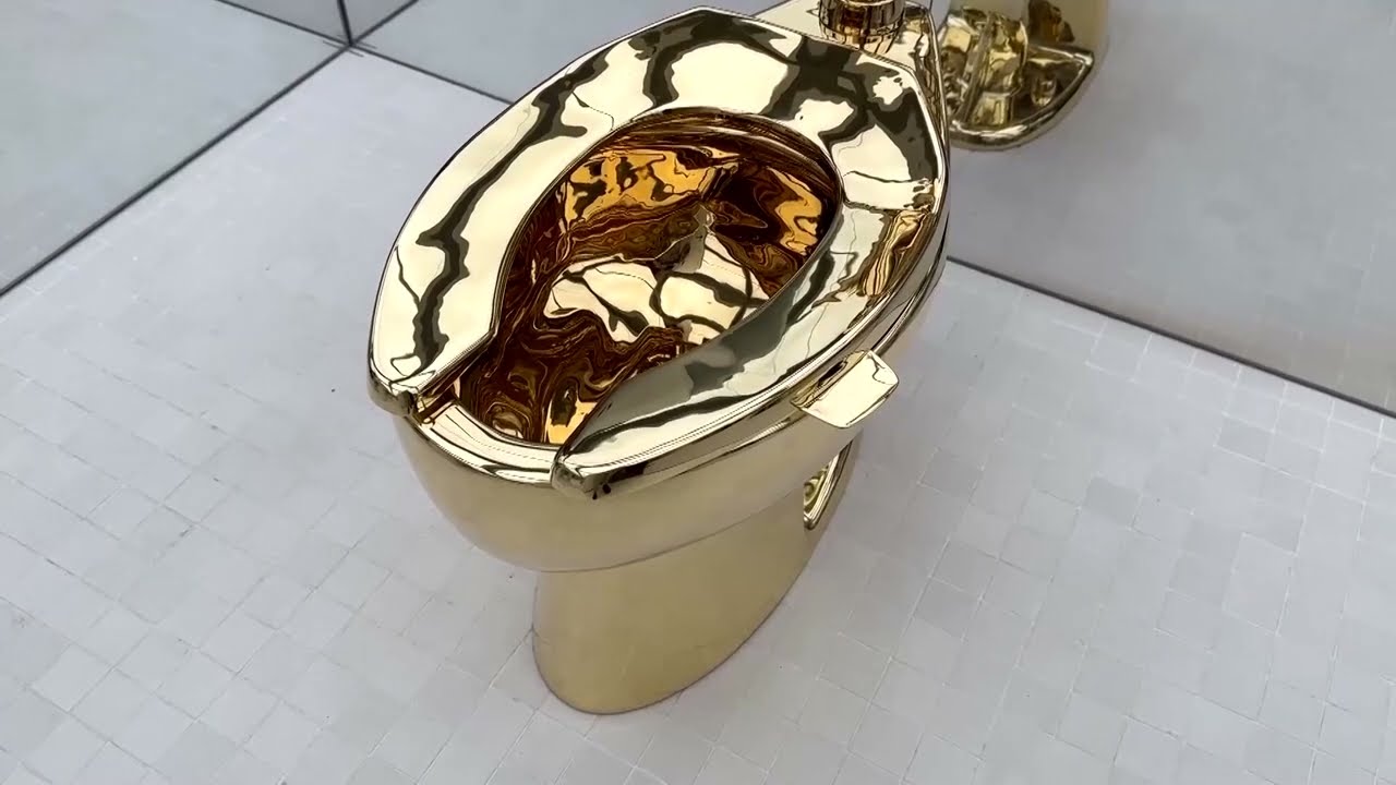 18-karat gold toilet sells for $12 million at Sotheby's auction | REUTERS