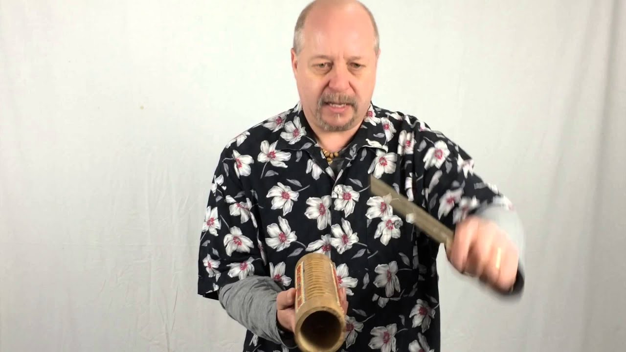 How to play the Guiro