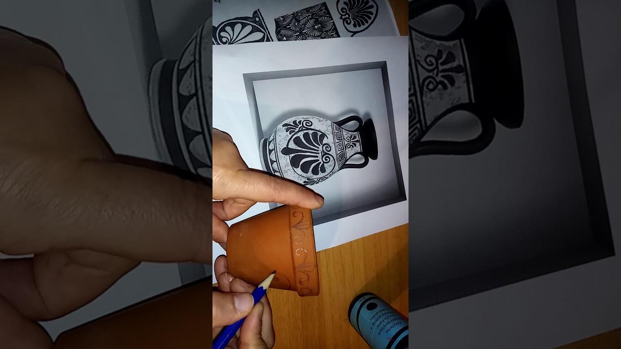 Vaso sfondo rosso con disegni neri.. arte greca