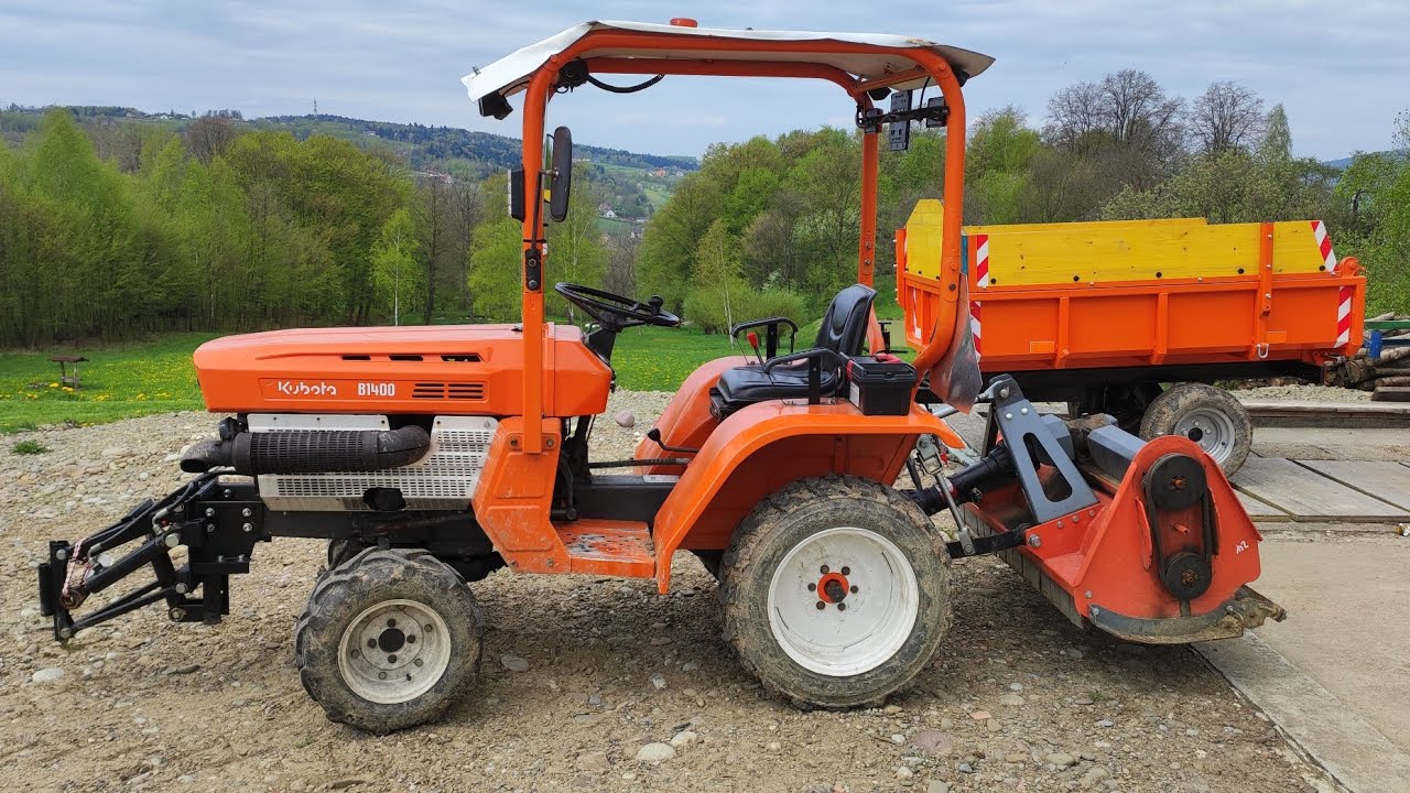 Kubota B1400 z kosiarką mulczerem, koszenie  nożami typu 