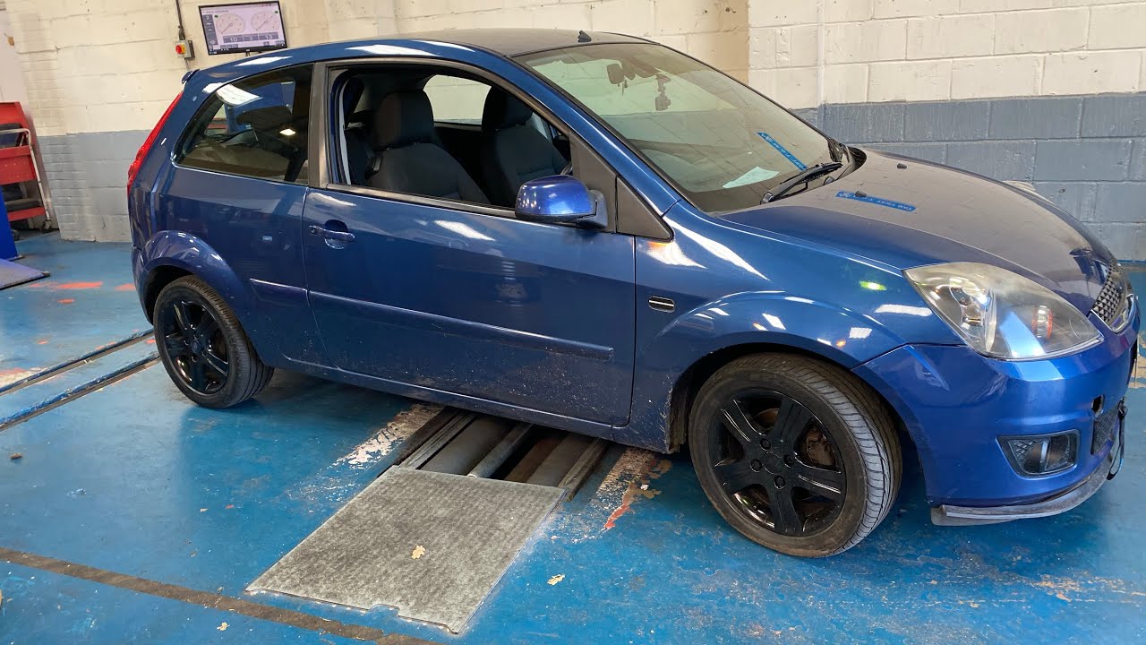 Spraying The Fiesta Wheels Black