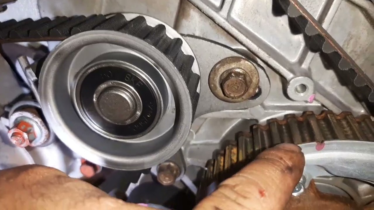 MITSUBISHI L200 OUTDOOR MOTOR 2.5 TROCA CORREIA DENTADA E RETIRANDO VAZAMENTO DE OLEO NO MOTOR
