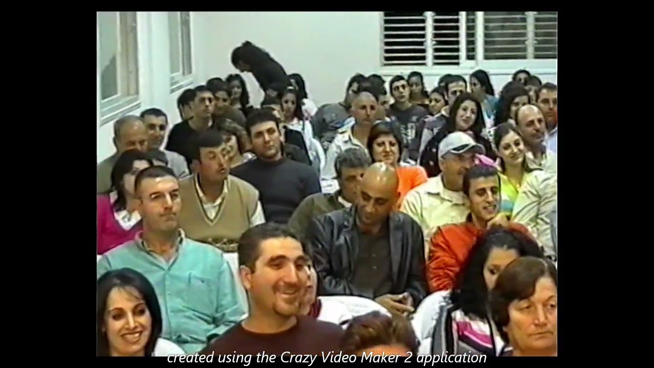 الزجال شحاده خوري ورايق خير في قاعة الكنيسة في ابو سنان 10 12 2005