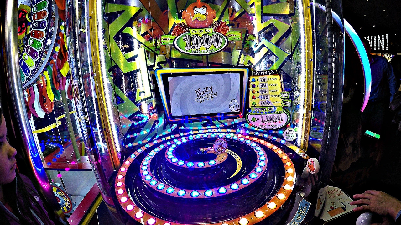 Kids Playing Dizzy Chicken Redemption Arcade Game At The Family Entertainment Center