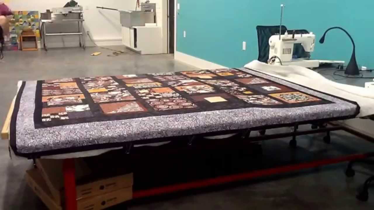 Basting a quilt with The Quiltak Basting System.