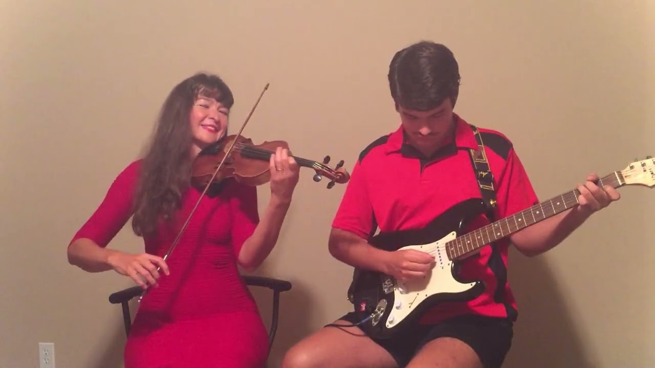 “Cant’ Stop Falling In Love With You” by Elvis. Aija Izaks and her son Eriks Izaks 🎻🎸