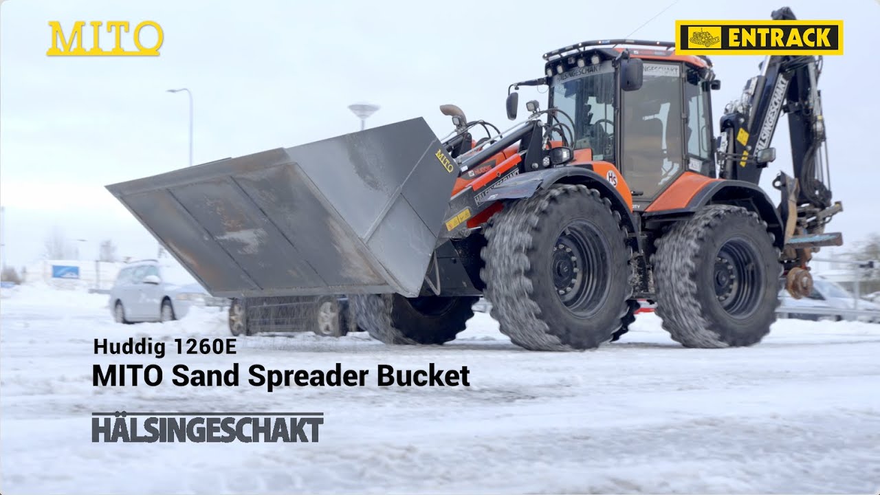 Huddig 1260E backhoe loader with MITO Sand Spreader Bucket