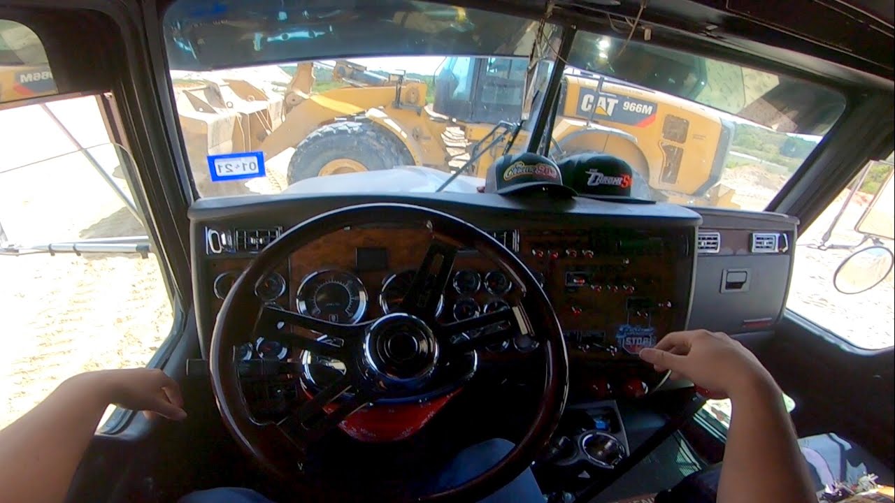 POV end dump trucker hauling 24 tons of sand | cargando 24 toneladas de arena