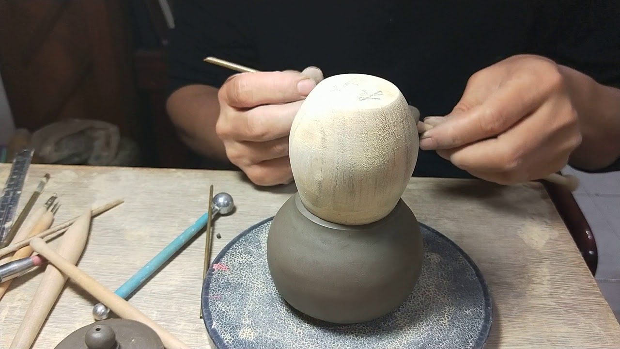 手捏圓壺