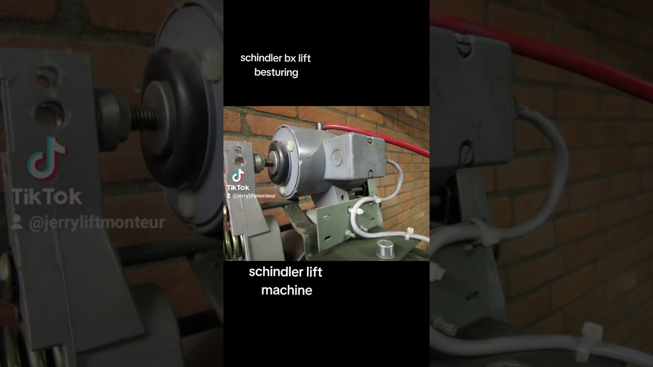 schindler liftje. snelheidsbegrenzer, vangbalk met buffer, spanwiel snelheids begrenzer