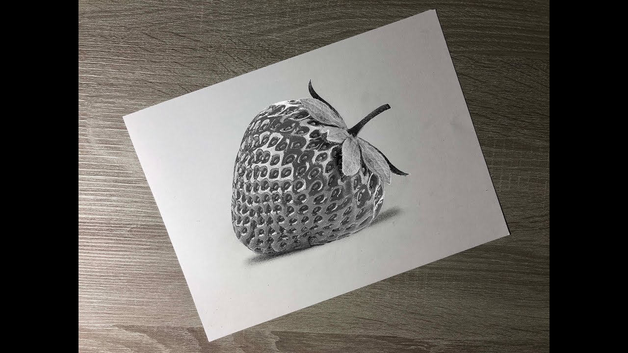 Realistic strawberry drawing with graphite pencils