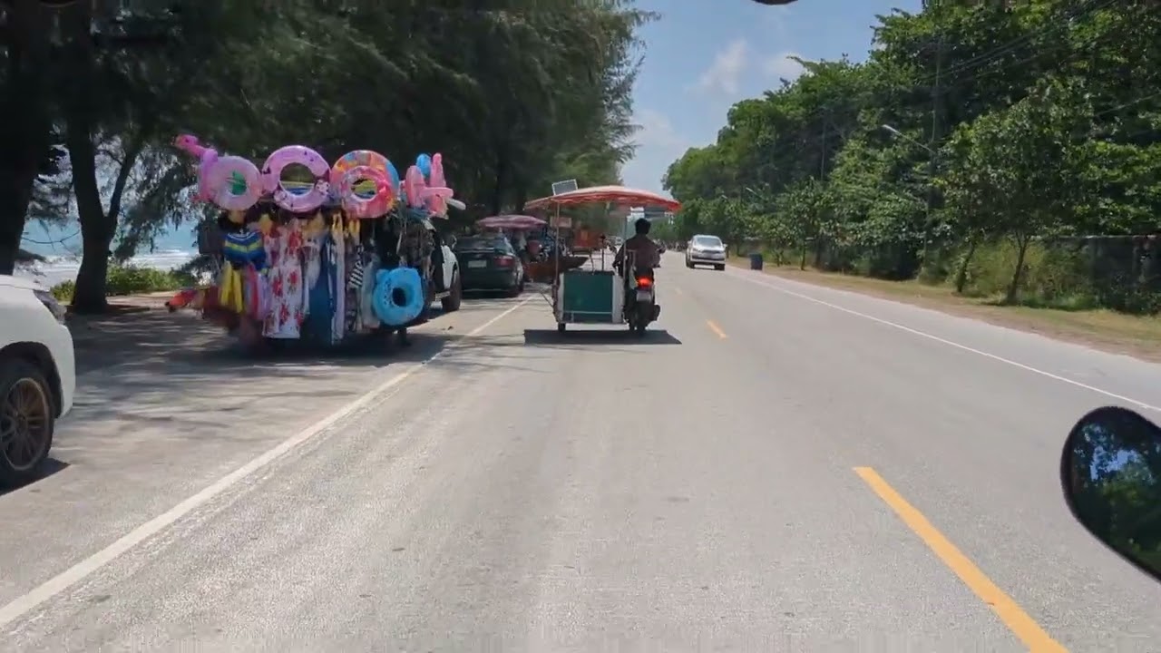Mae Phim Thailand taxi along beach road