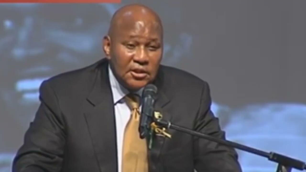 Dr. Kaizer Motaung speaking at the funeral of John 