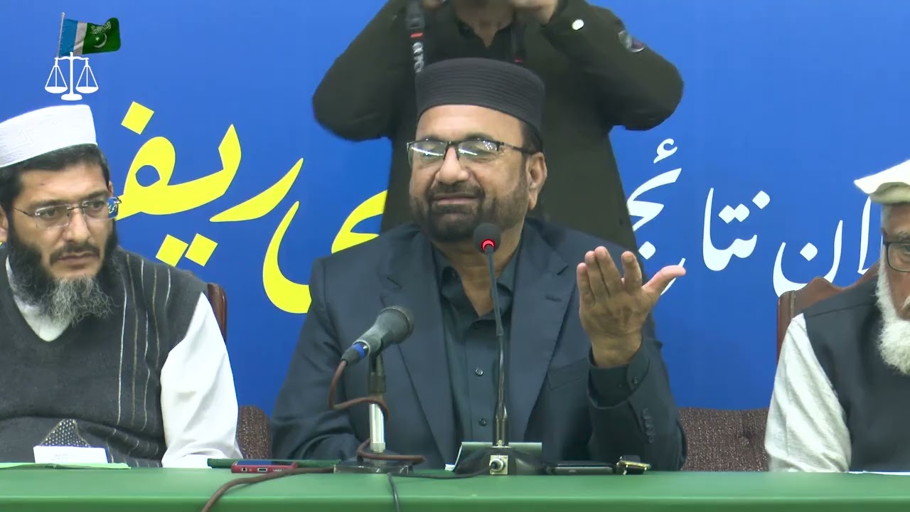 Dr. Tariq Saleem is teaching Quran lessons  to the participants of the Central Training Center