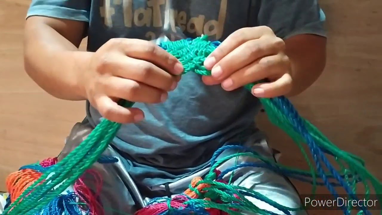 poniendo manguillos a hamacas
