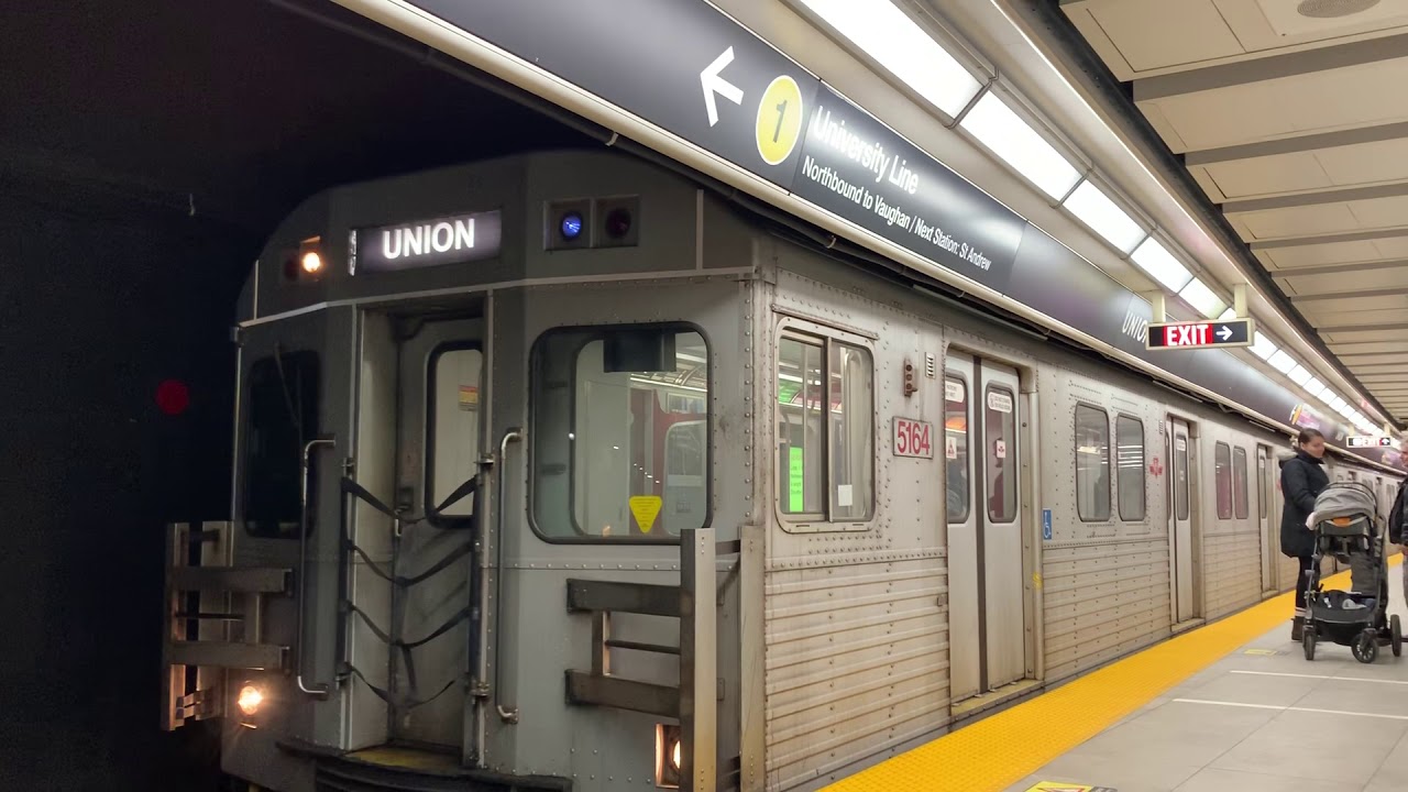 TTC Line 1 T1 Train departs Union Station.