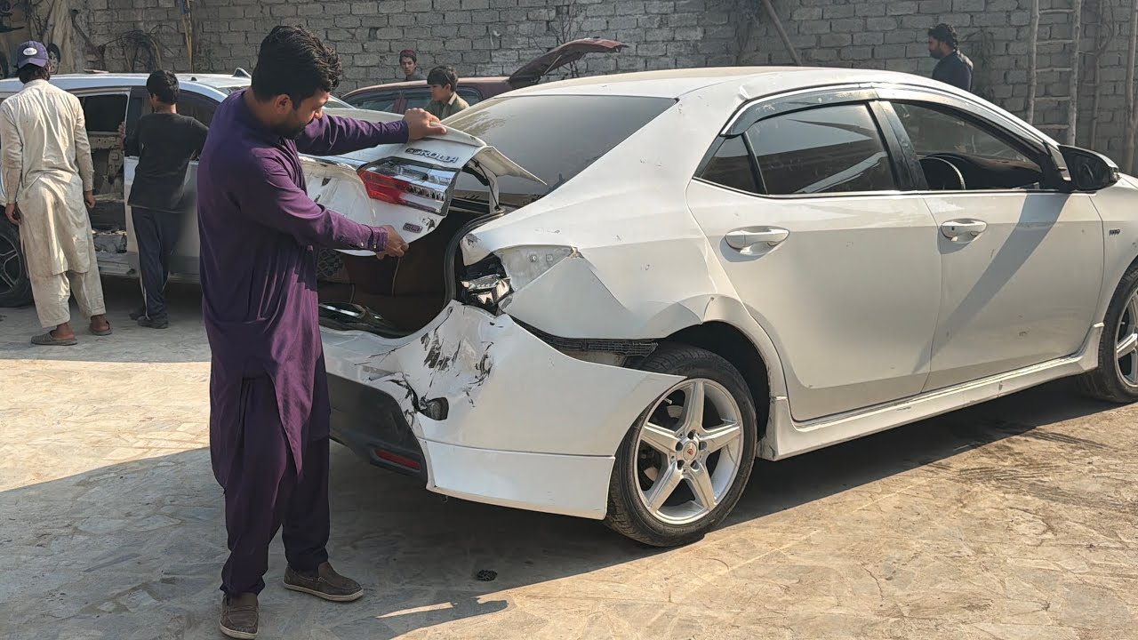 Damaged White Toyota Corolla GLI Rear Accident – Salvage Car Condition