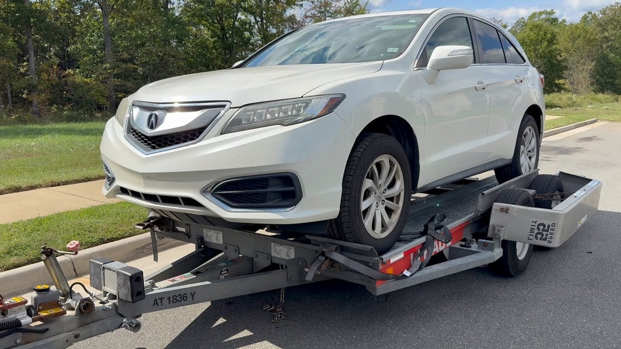 Как прицепить автовоз U-Haul и загрузить свой автомобиль