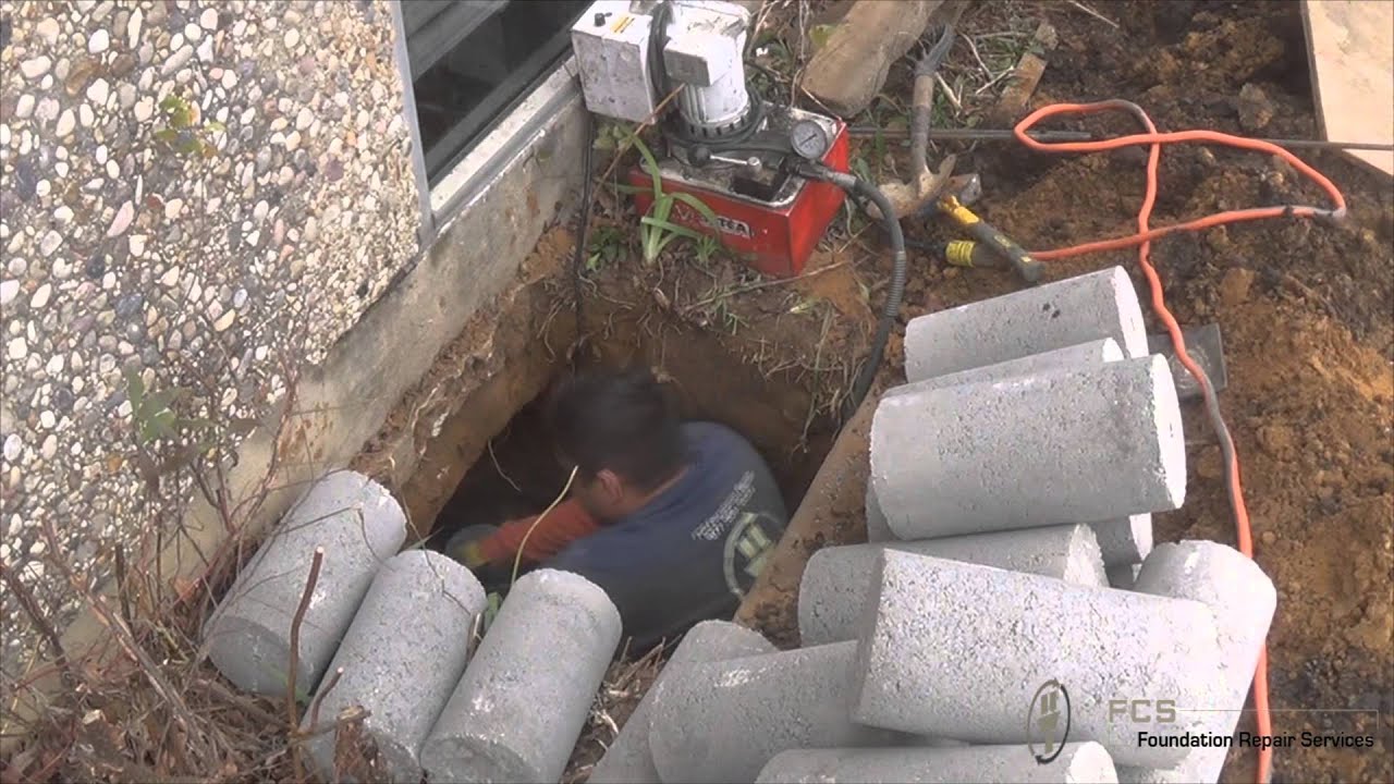 Foundation repair double press concrete piers