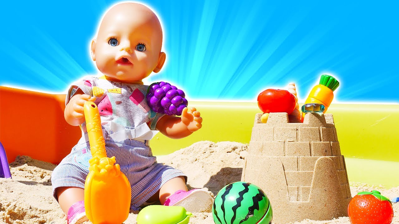 Baby Annabell & sand castle at the sandbox. Kids play with dolls & Baby Born doll videos for kids.