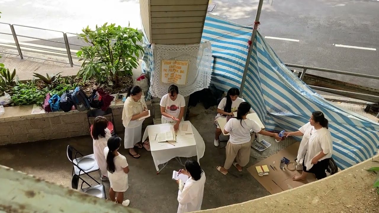 Assembly of the Uni&oacute;n Espiritista Cristiana de Filipinas, Inc. under a Flyover in Hong Kong