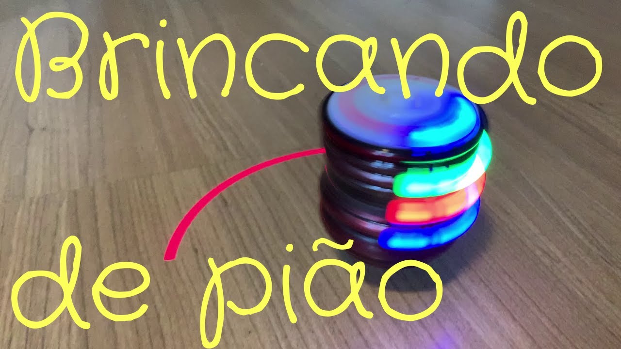 Brincando com os meus piões. Pião com luz e música. Roda pião.