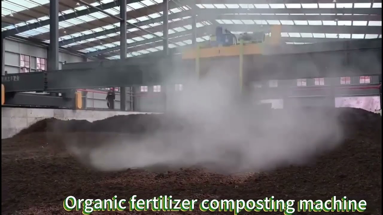 Motor driven trough compost turner