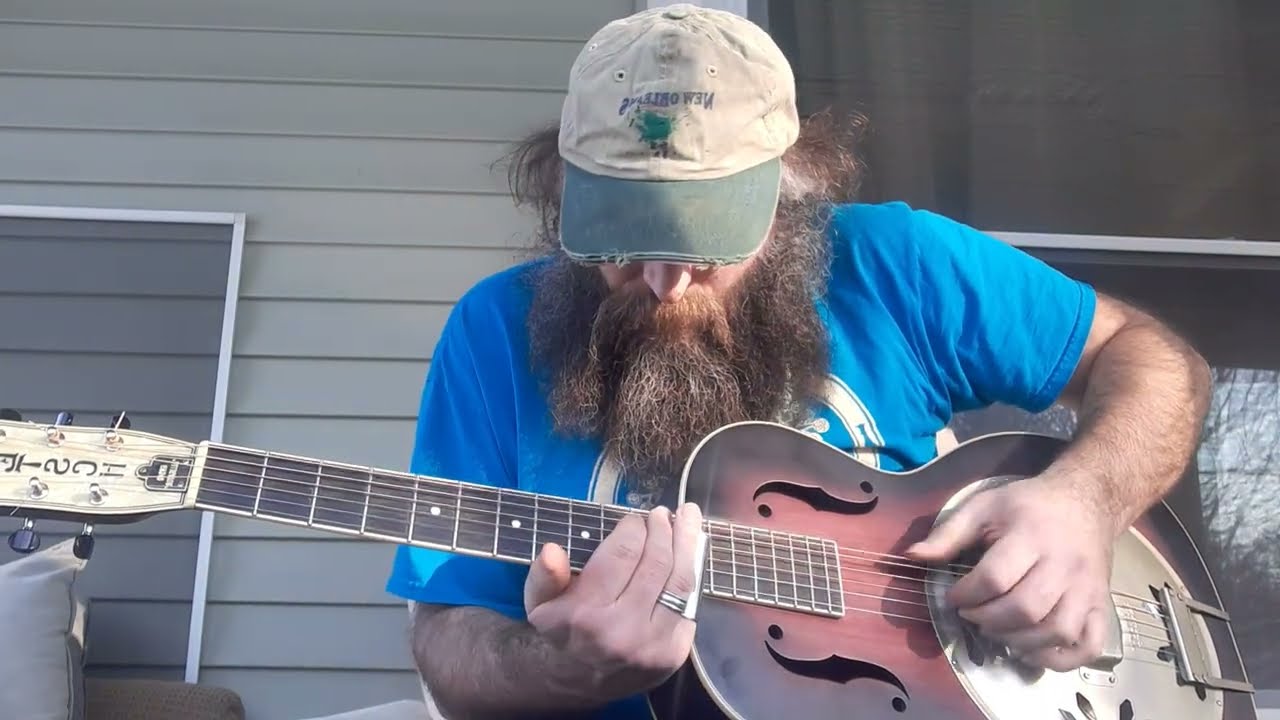 Chubba Smokeybeard sings the blues on front porch