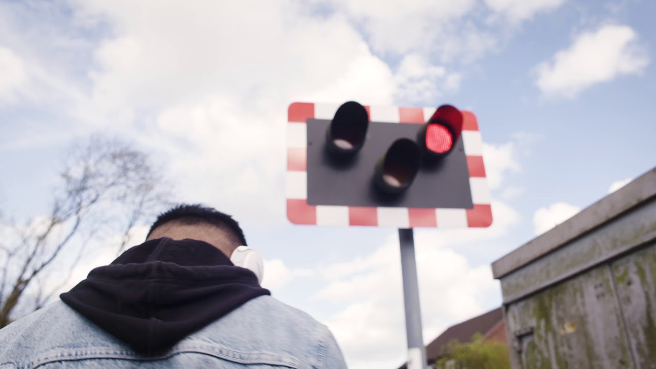 Level crossings - Teenager distracted by music