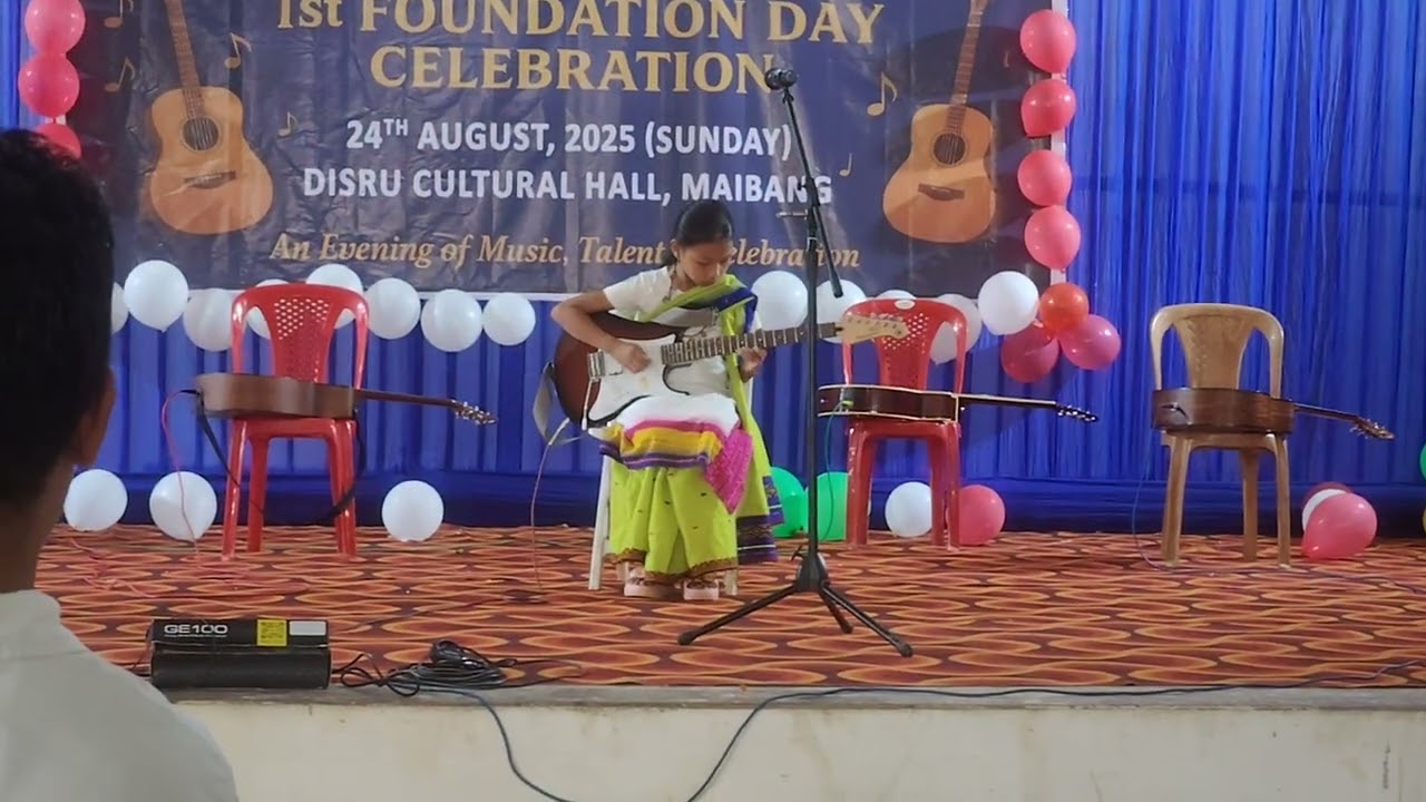 Playing Dimasa murithai with guitar 