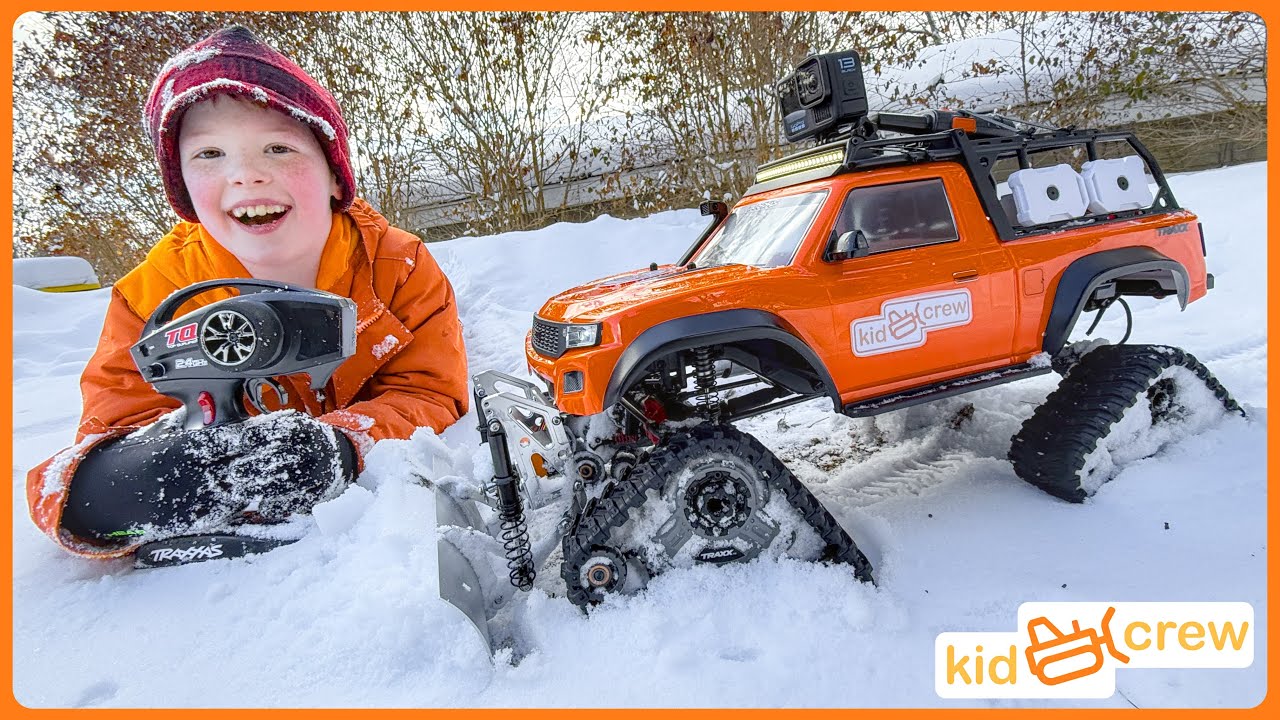 Remote controlled truck saves dad and plows snow with crawler tracks. Educational | Kid Crew