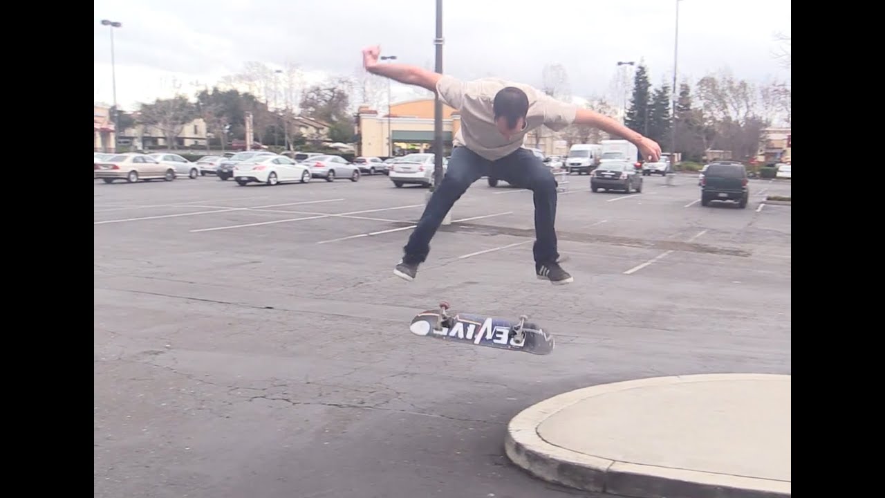 LANCE LANDS A HEELFLIP OFF A CURB