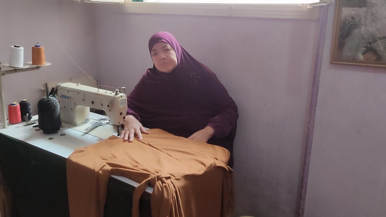 قص وخياطه قصه فستان جميله جدا بربيطه من الجناب