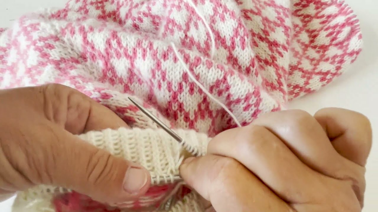 Video 10 in Spot sweater KAL: How to fold down neck edge