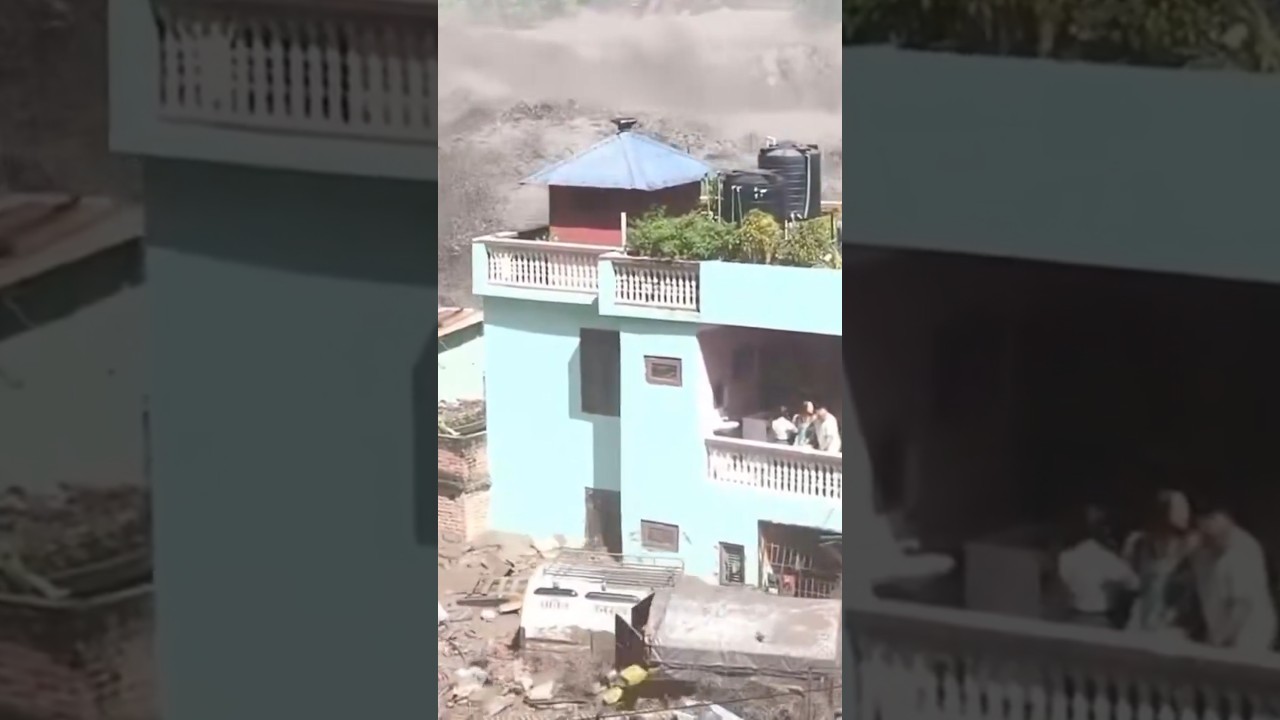 House nearly engulfed by Nepal floodwaters